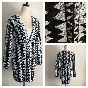 HOT MIAMI STYLES Long Sleeve Black White Sequined Low Cut V Neck Slit Hem Dress
